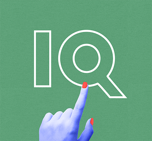 Hand with painted finger nail pointing to the letters IQ